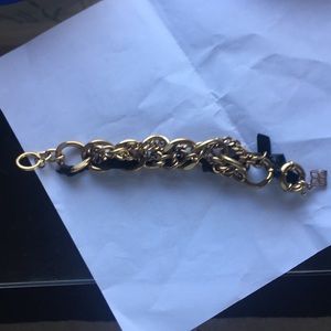 BCBG metal and black leather bracelet